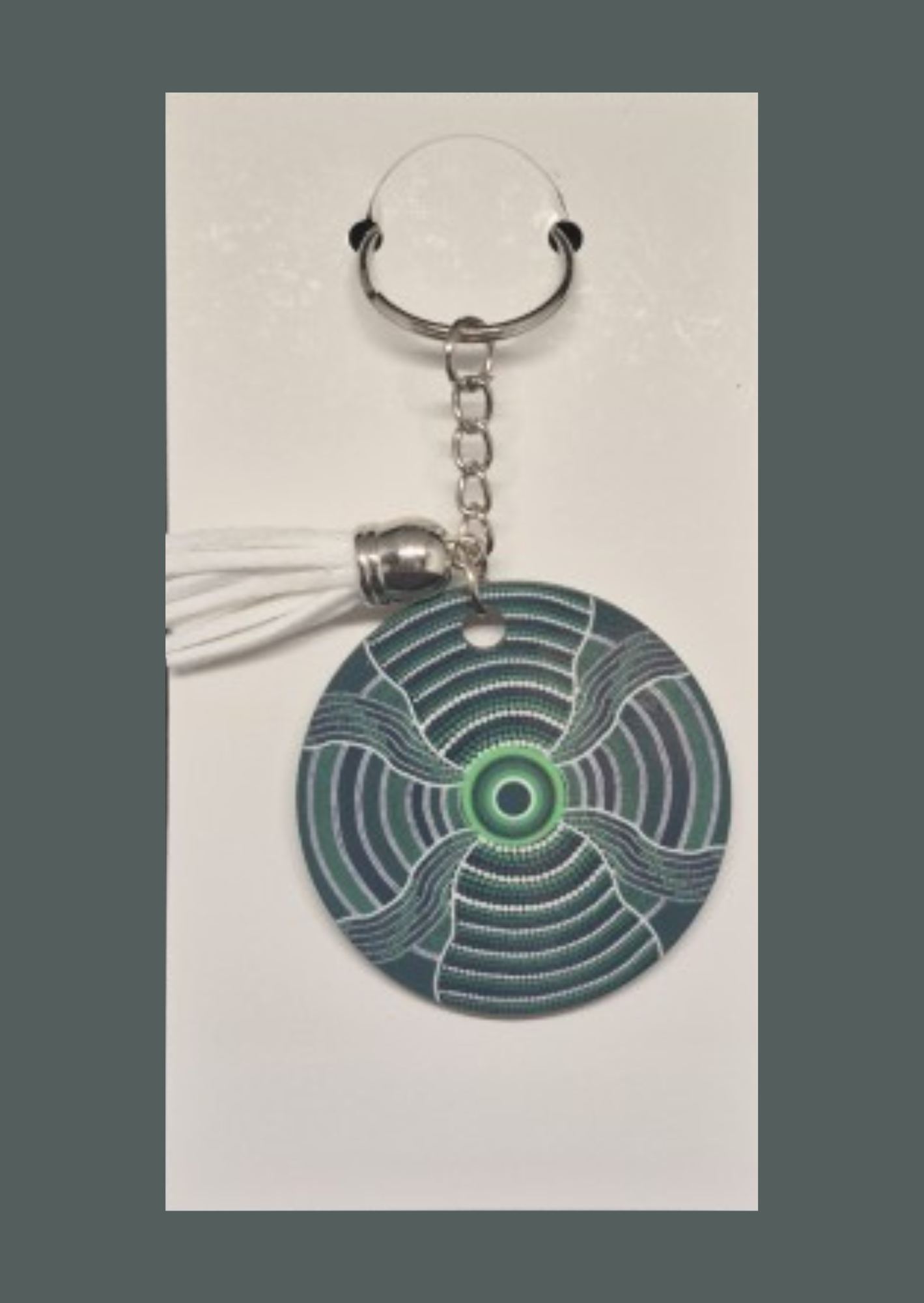 Monsoon's Spirit - Round Keyring with Assorted Coloured Tassel